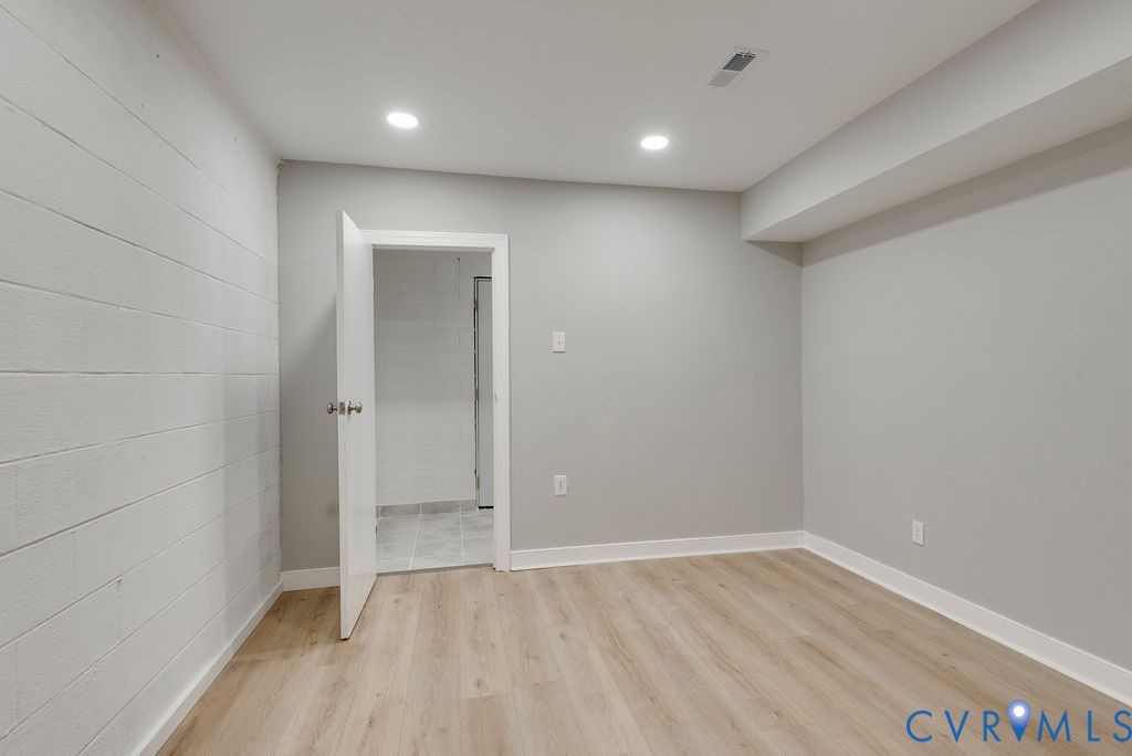 8510 Hunton Circle North Chesterfield, VA 23235 - Photo 25 of 32 wooden floor in an empty room with a window