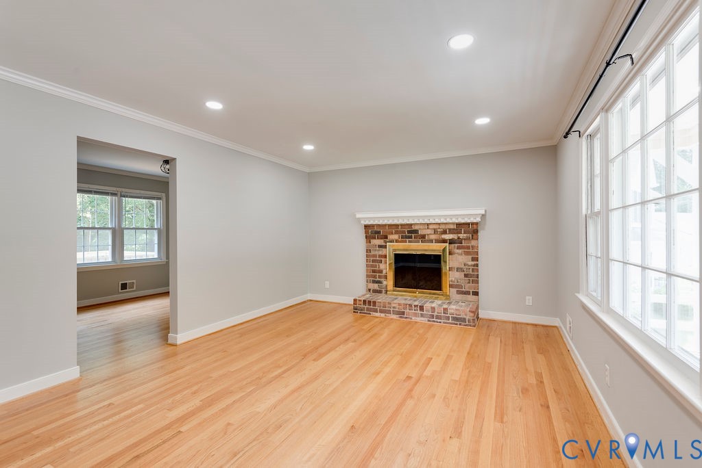 8510 Hunton Circle North Chesterfield, VA 23235 - Photo 3 of 32 a view of an empty room with a fireplace and a window