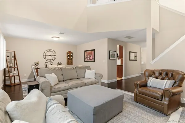 a living room with furniture and a couch
