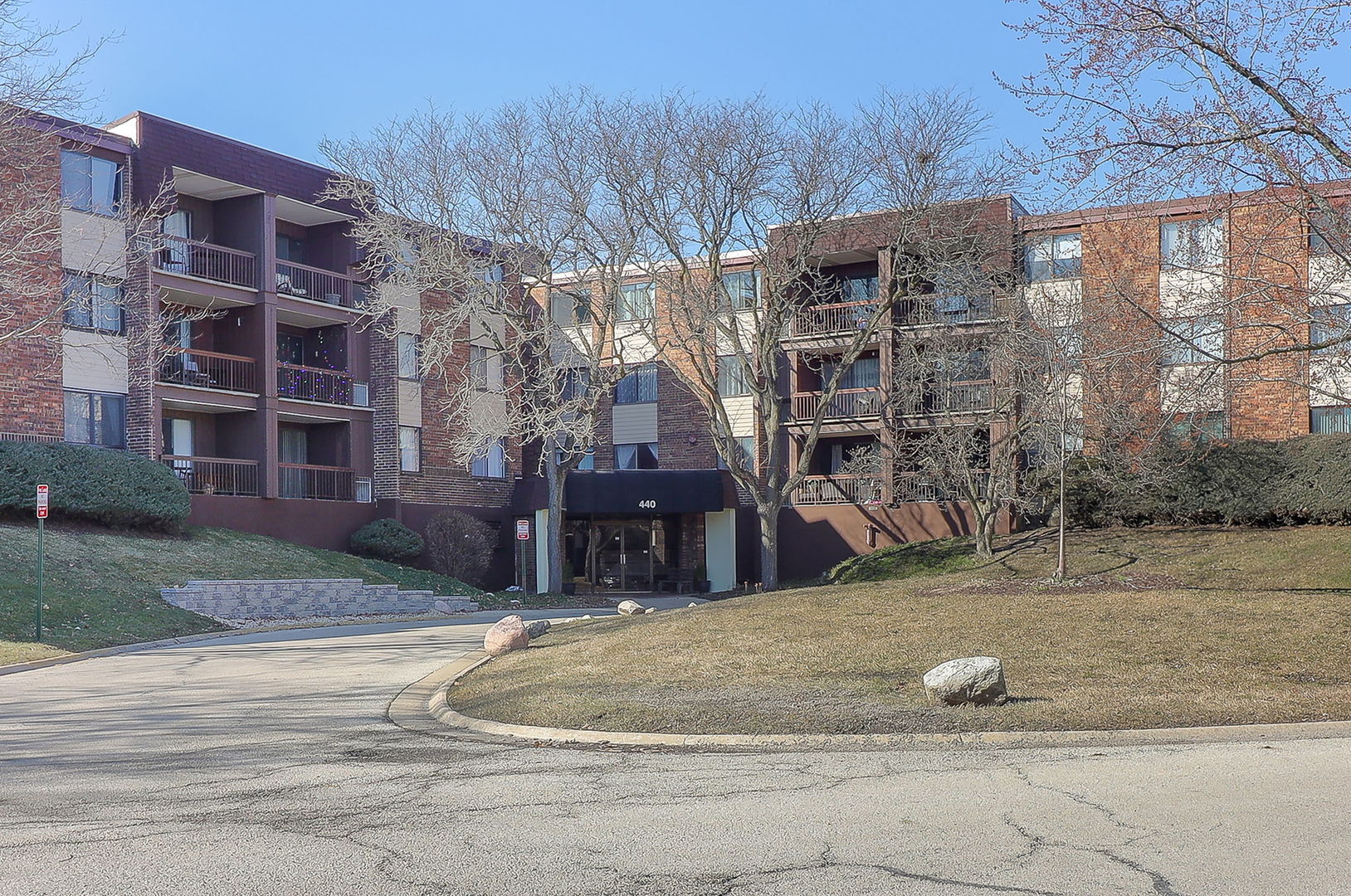 440 Raintree Court, Unit 2D Glen Ellyn, IL 60137 - Photo 1 of 23 a view of a house with a yard