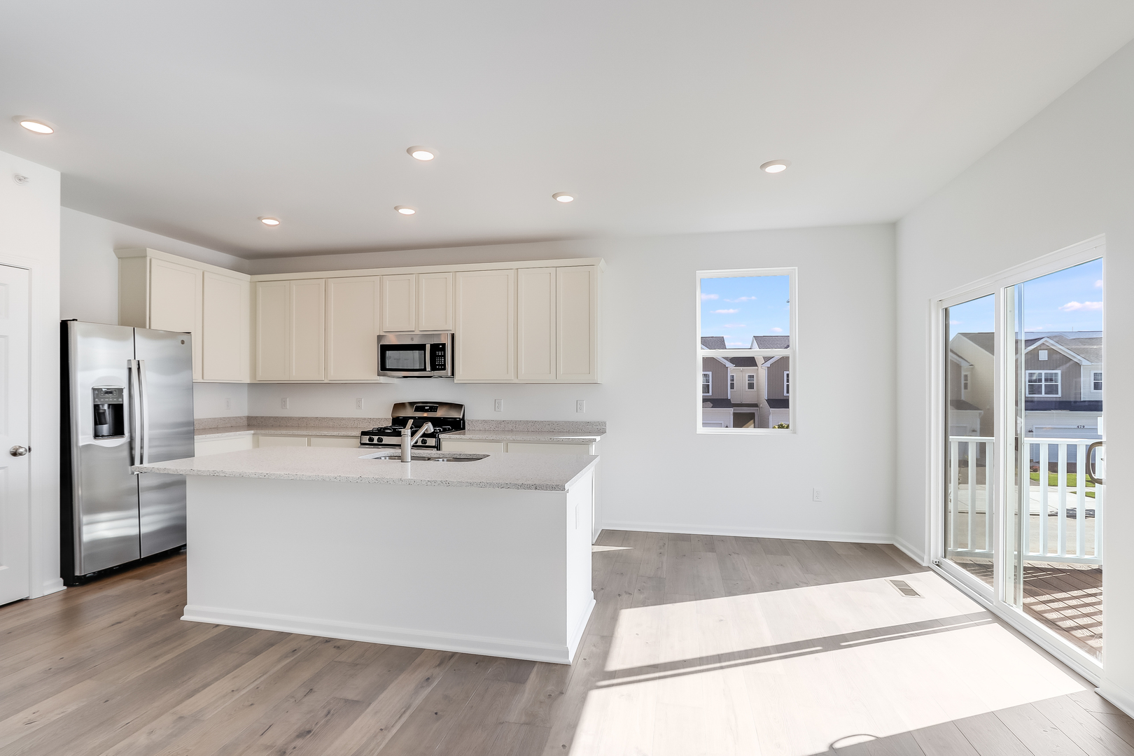 460 Comstock Road South Elgin, IL 60177 - Photo 11 of 31 a view of kitchen with stainless steel appliances kitchen island granite countertop a refrigerator oven a sink and dishwasher