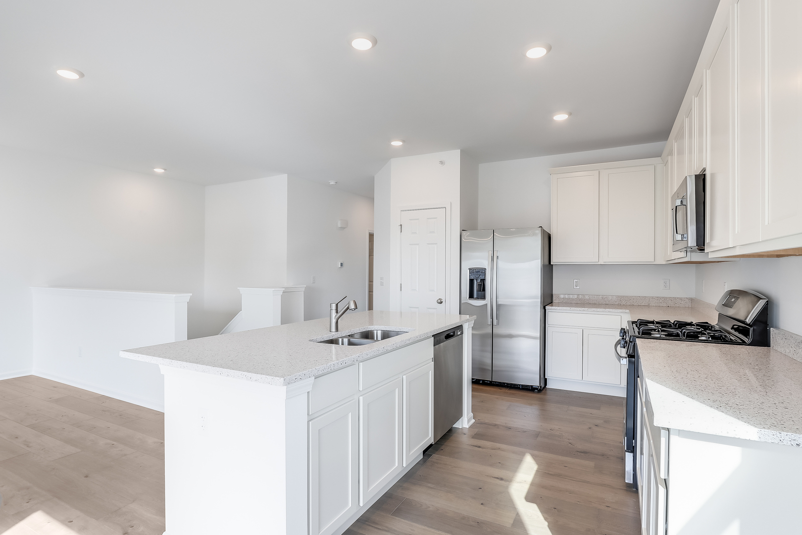 460 Comstock Road South Elgin, IL 60177 - Photo 16 of 31 a kitchen with a sink a stove a refrigerator and cabinets