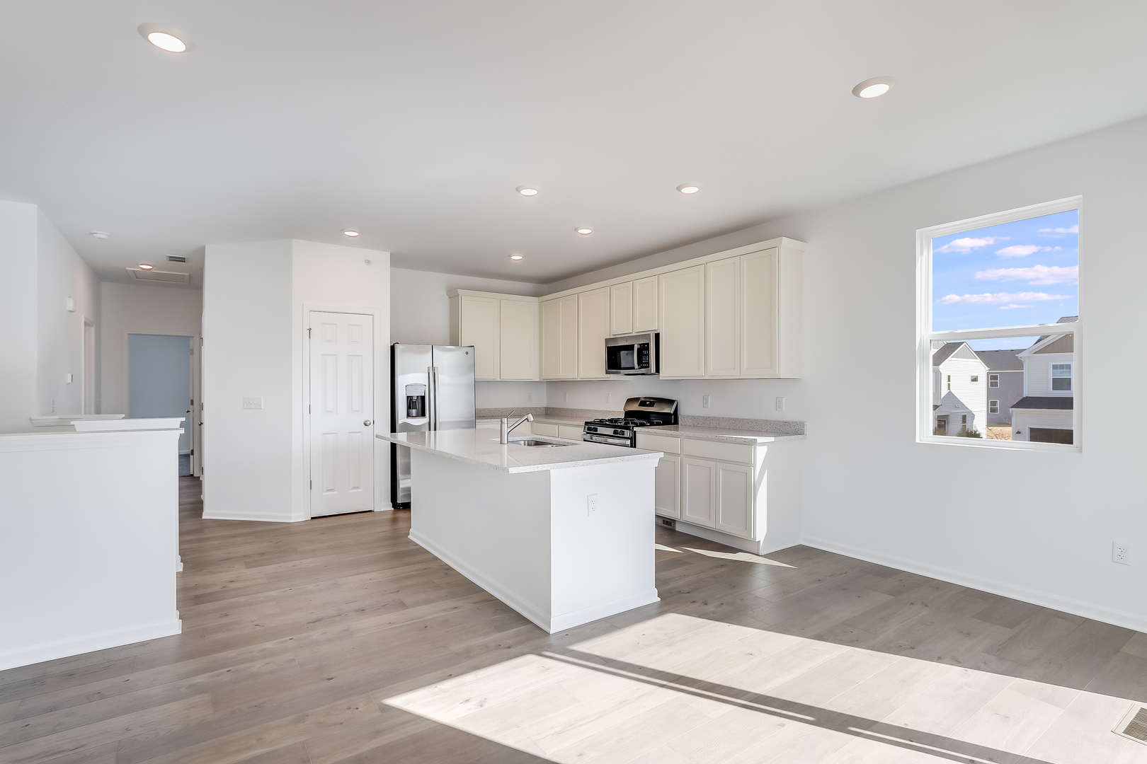 460 Comstock Road South Elgin, IL 60177 - Photo 18 of 31 a kitchen with white cabinets and white appliances