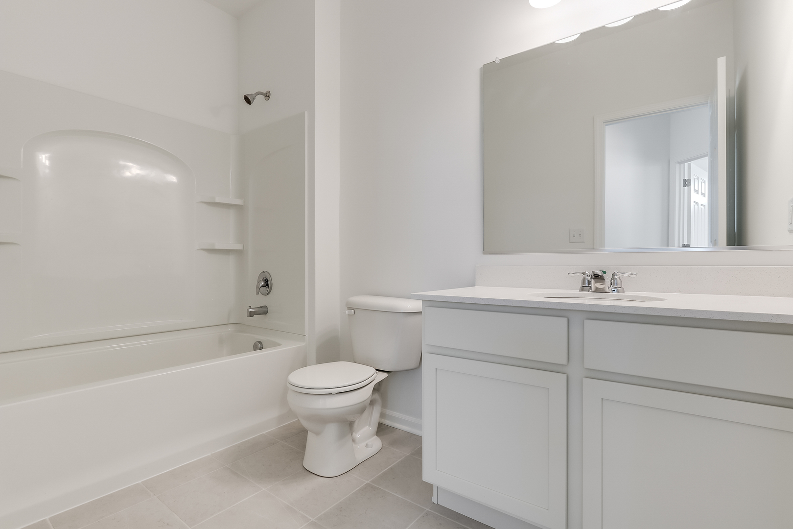 460 Comstock Road South Elgin, IL 60177 - Photo 23 of 31 a bathroom with a sink a toilet and a bathtub