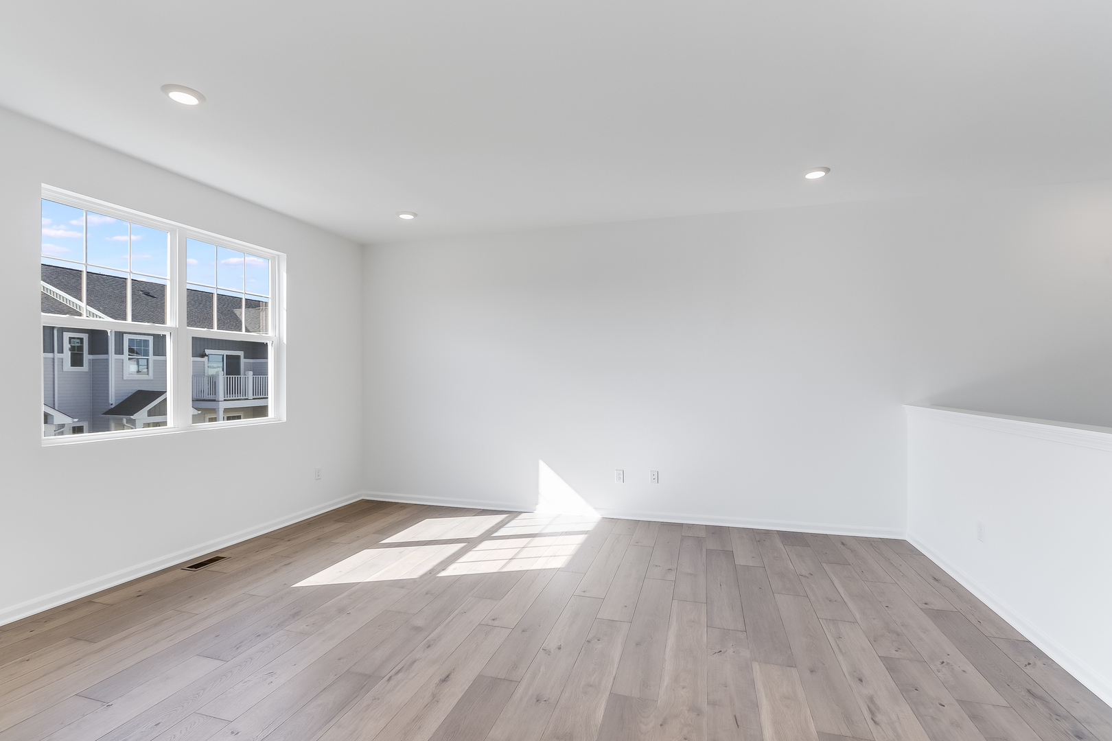460 Comstock Road South Elgin, IL 60177 - Photo 6 of 31 a view of empty room with wooden floor and fan