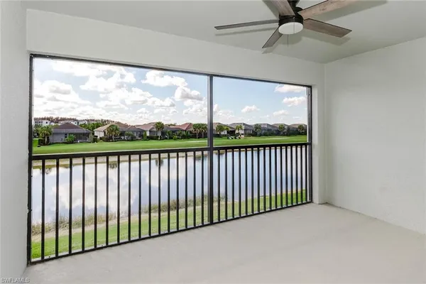 a view of a balcony with wooden floor