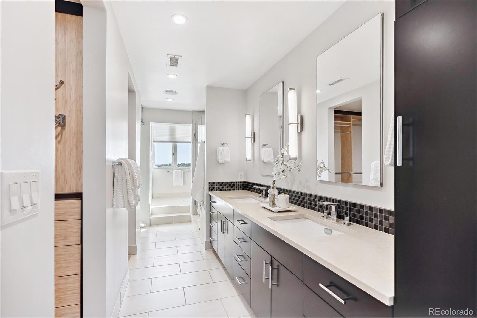 1133 Race Street, Unit 8 & 9 B Denver, CO 80206 - Photo 23 of 50 a spacious bathroom with a double vanity sink mirror and double