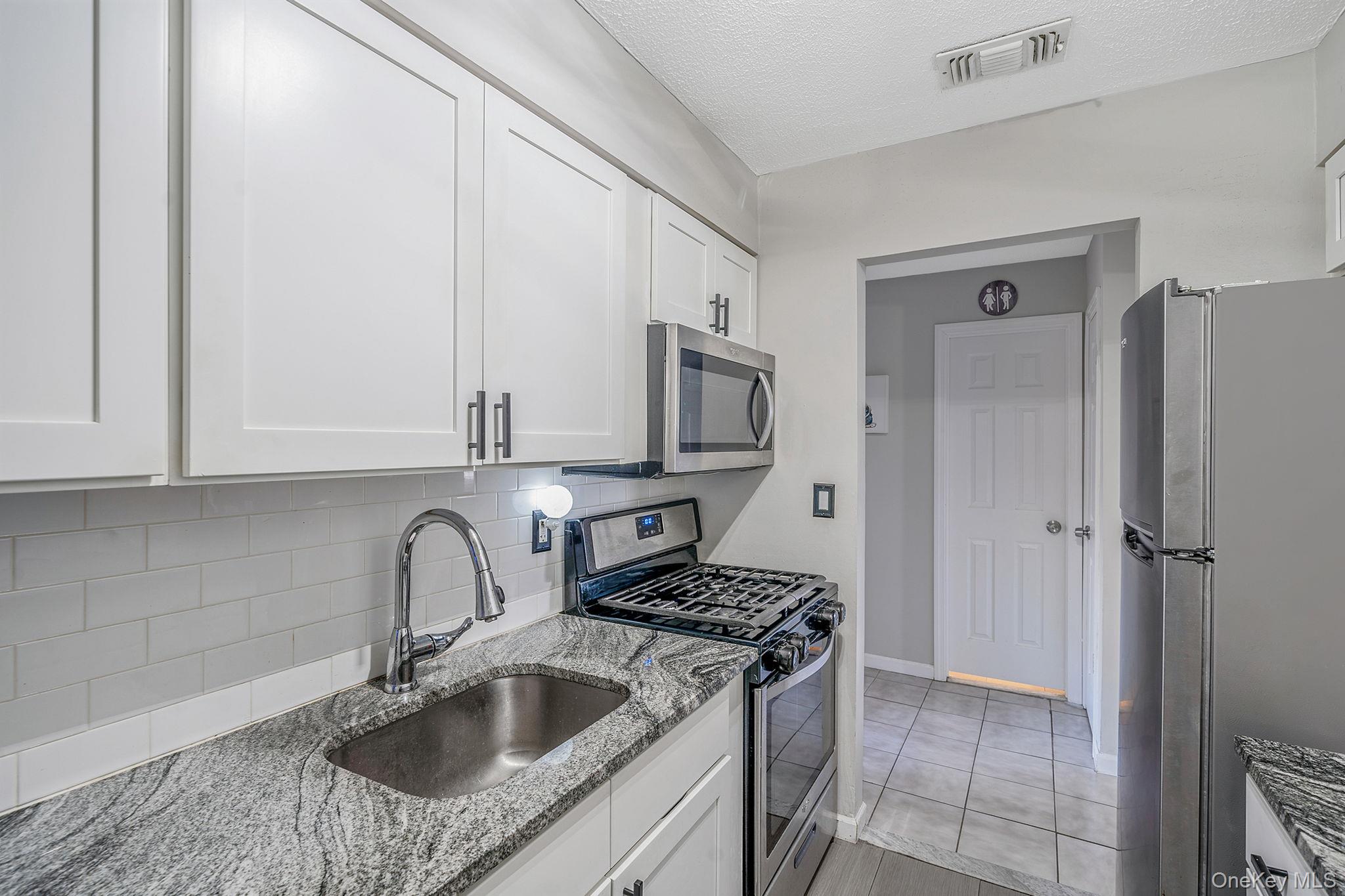 201 Lake Pointe Circle, Unit 201 Middle Island, NY 11953 - Photo 13 of 19