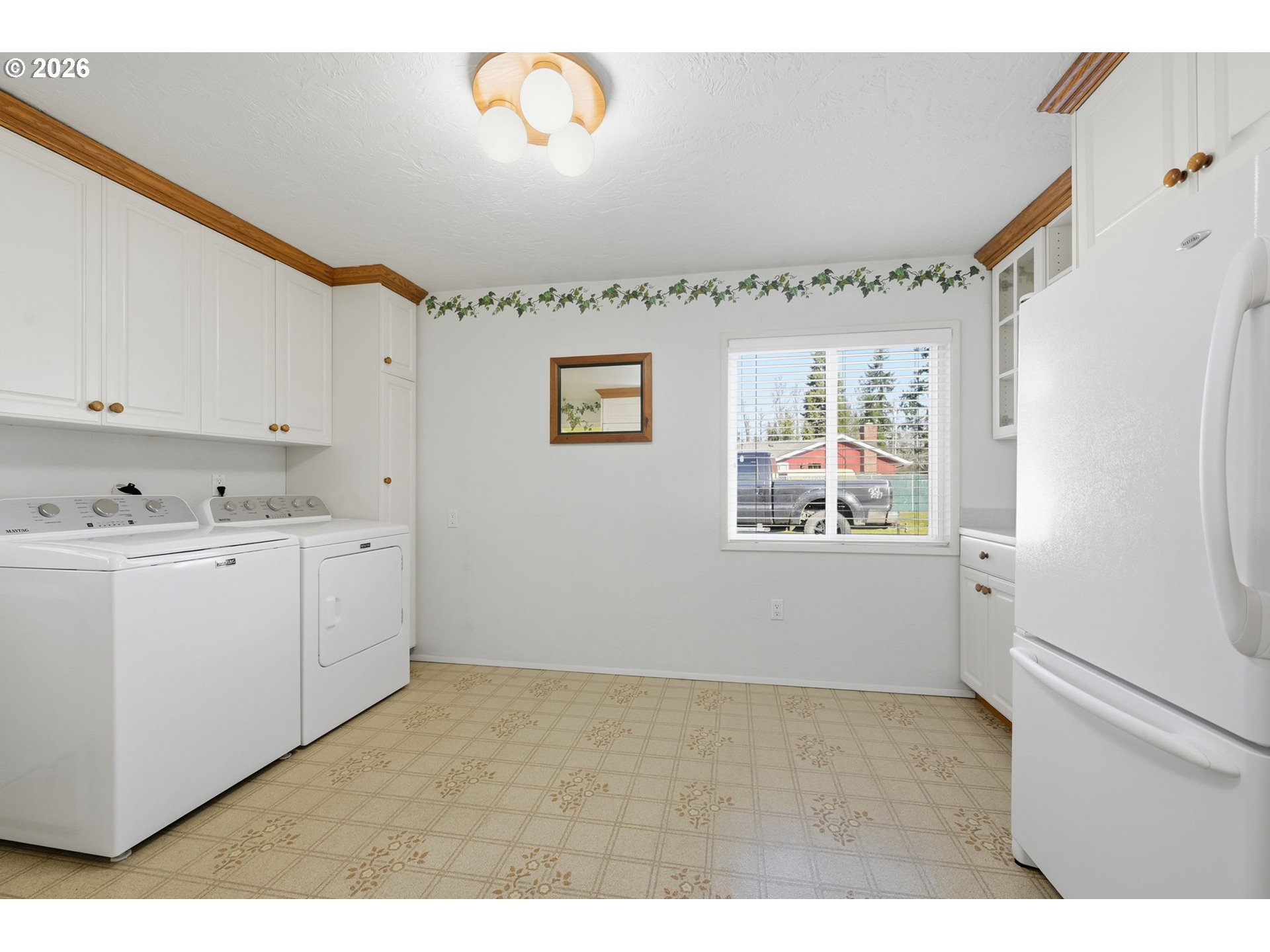 87856 Cedar Flat Road Springfield, OR 97478 - Photo 13 of 37 a kitchen with cabinets and window