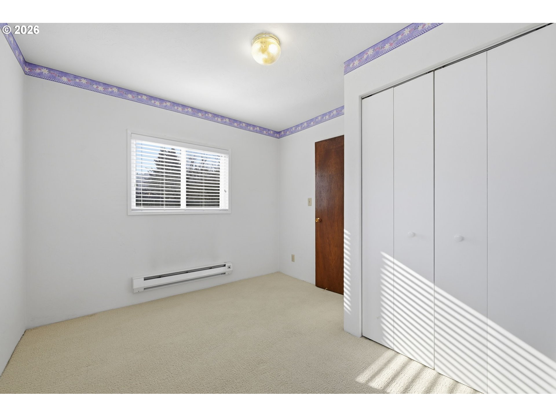 87856 Cedar Flat Road Springfield, OR 97478 - Photo 20 of 37 a view of an empty room with wooden floor