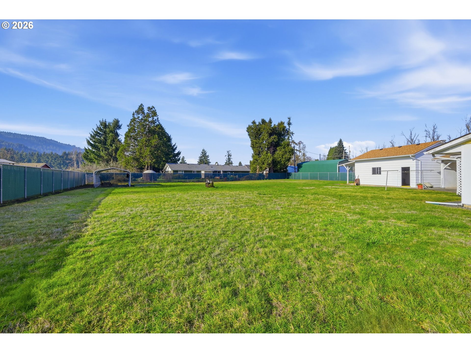 87856 Cedar Flat Road Springfield, OR 97478 - Photo 31 of 37 a house with garden in front of it