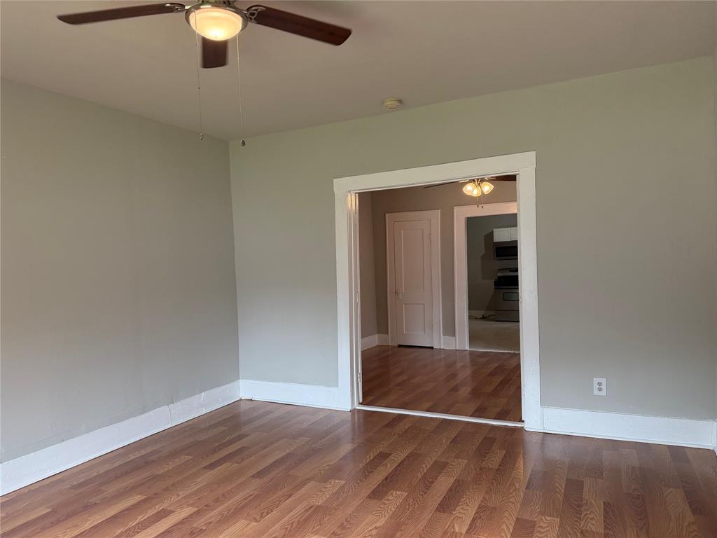 801 Wayne Street Dallas, TX 75223 - Photo 11 of 15 a view of a livingroom with wooden floor