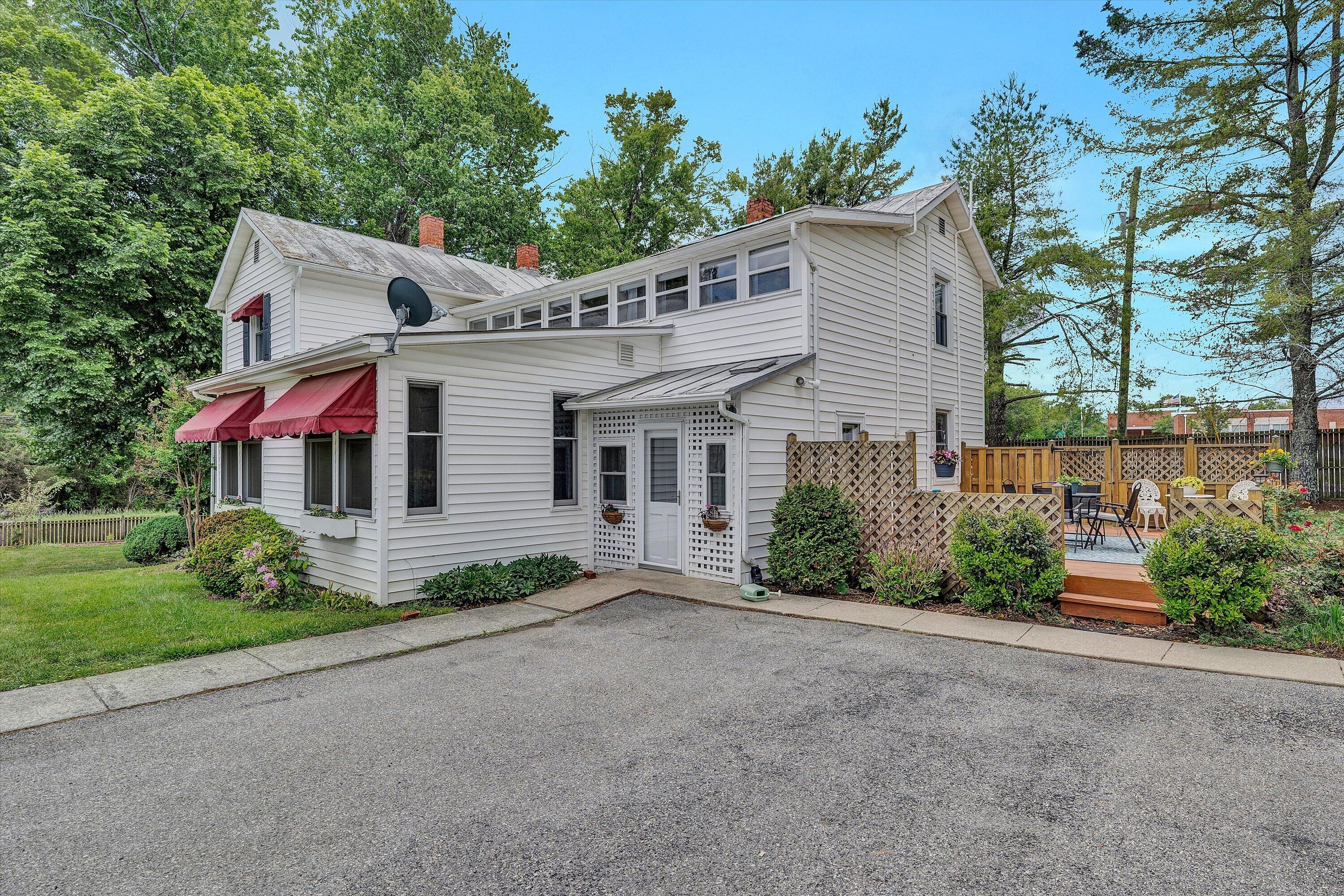 341 Springwood Road Fincastle, VA 24090 - Photo 41 of 55 a front view of a house with a yard and garage