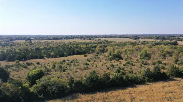 a view of a road with an ocean view