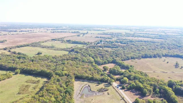an aerial view of beach and ocean