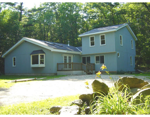 24 Saari Camp Road Ashburnham, MA 01430 - Photo 1 of 7 a house view with a outdoor space