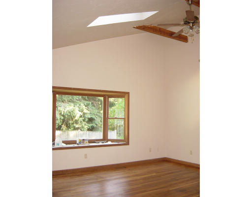 24 Saari Camp Road Ashburnham, MA 01430 - Photo 4 of 7 a view of a room that has a window in it
