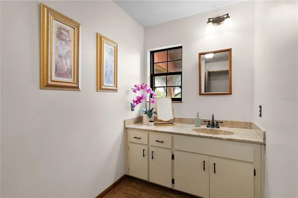 a view of a outdoor space with plants and sitting area