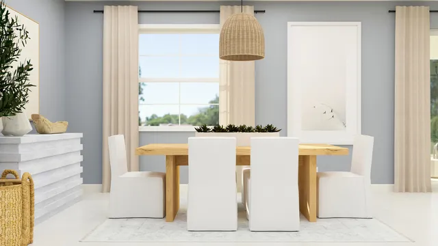 a front view of a house with wooden floor and a dining table