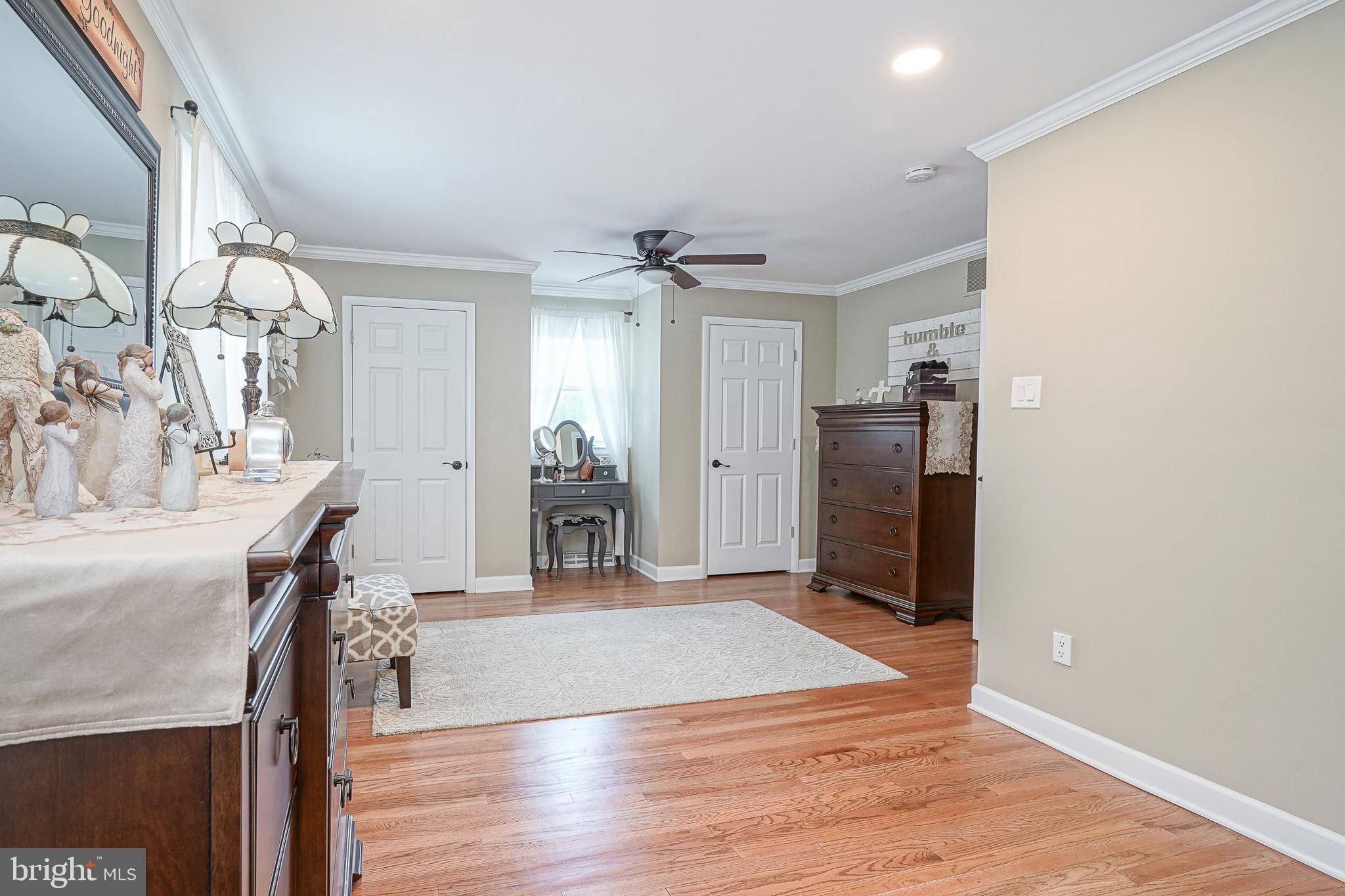 1024 Oxmead Road Eastampton, NJ 08060 - Photo 12 of 39 a view of a livingroom with a furniture hardwood floor and staircase