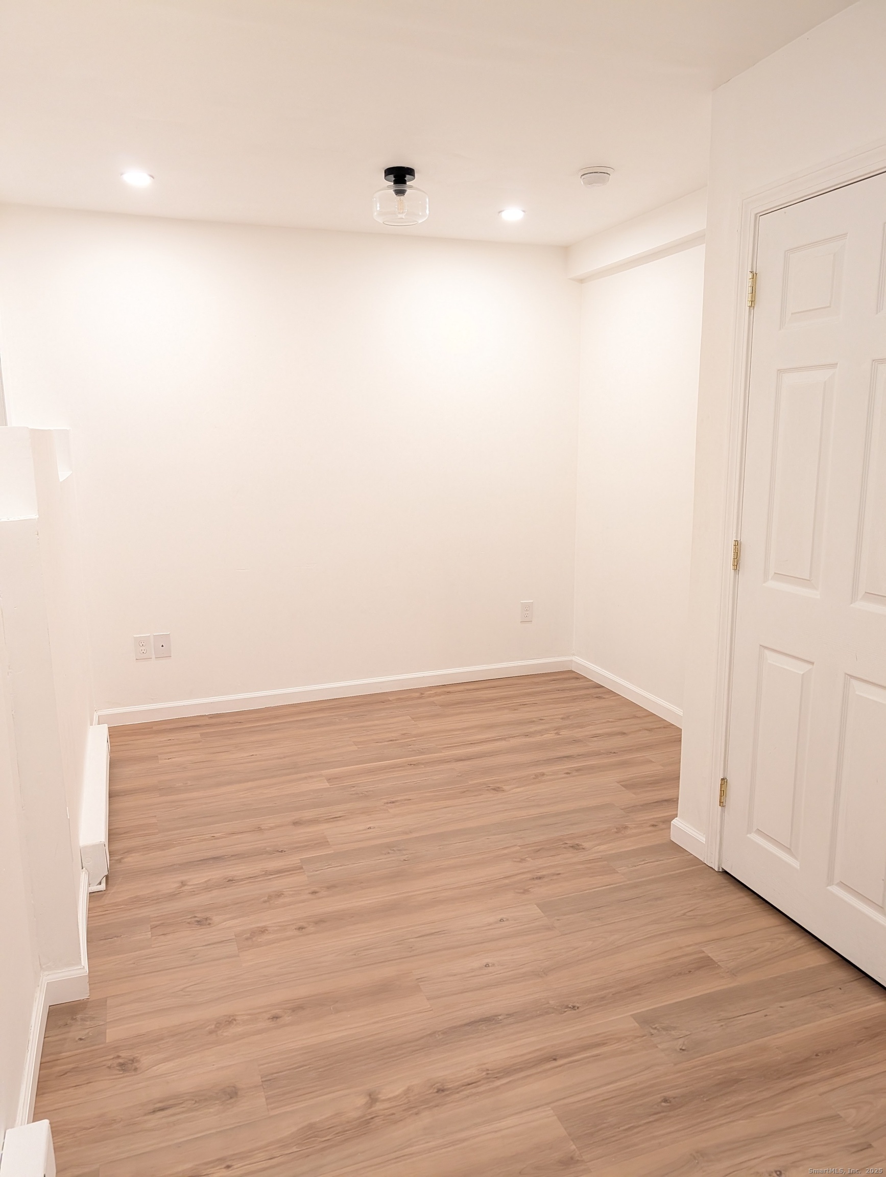 23 Mechanics Street, Unit 101 Putnam, CT 06260 - Photo 7 of 8 a view of an empty room