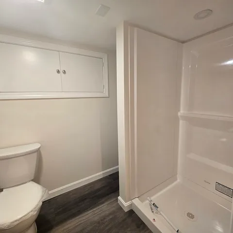 a bathroom with a toilet and a sink
