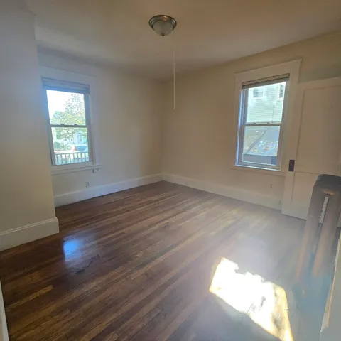 a view of an empty room and window