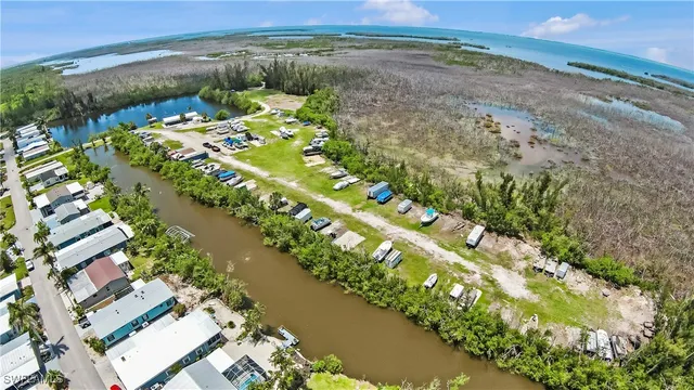 a view of a lake with a yard
