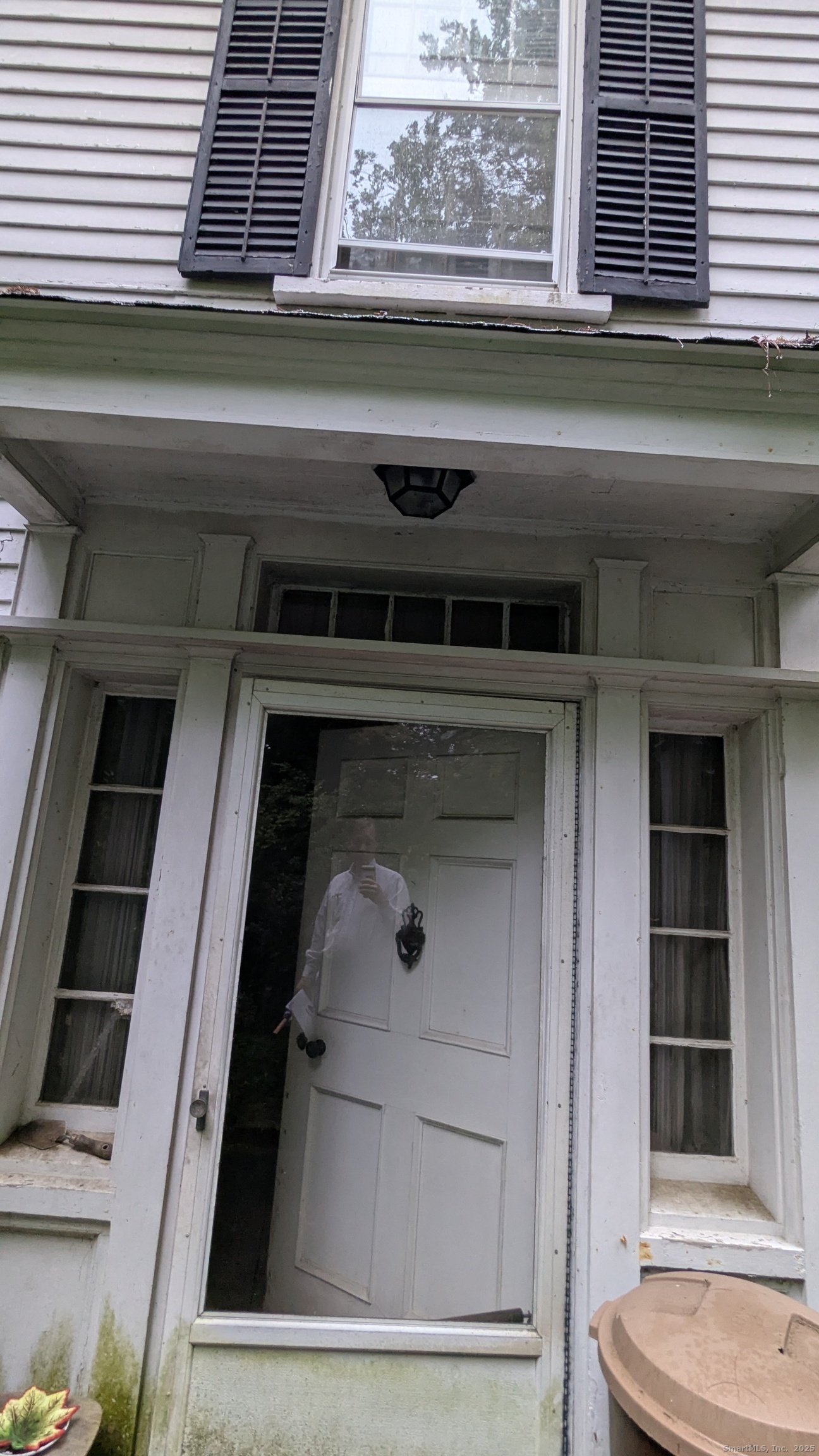 4 Woods Grove Road Westport, CT 06880 - Photo 5 of 11 a washer and dryer sitting on a shelf