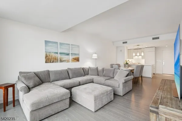 a living room with furniture and a couch