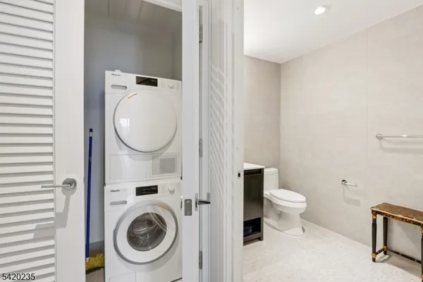 a bathroom with a toilet and a sink