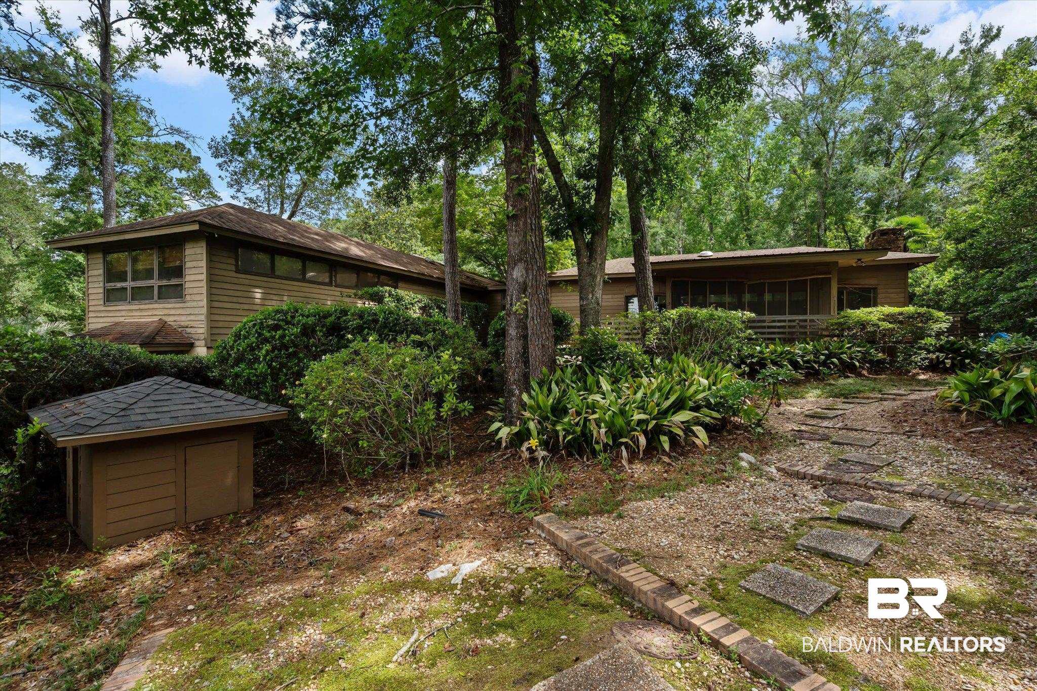 3500 Venetia Road Mobile, AL 36605 - Photo 36 of 56 Wood-sided residence surrounded by mature trees and lush landscaping