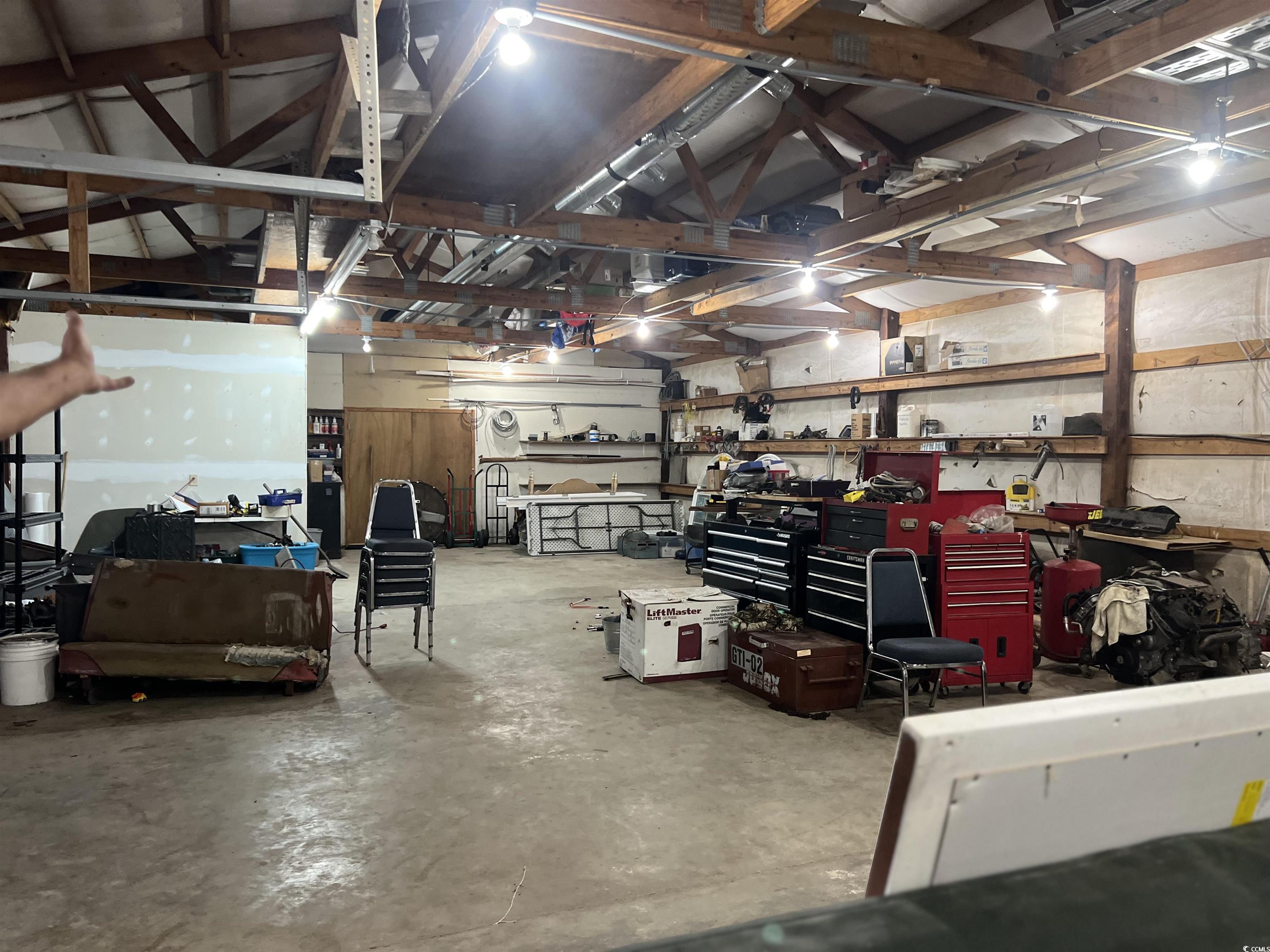 127 County Rd S-22-577 Georgetown, SC 29440 - Photo 8 of 11 Garage with a workshop area