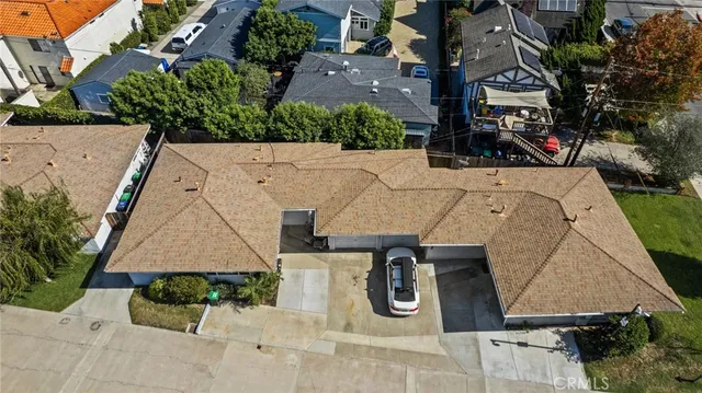 an aerial view of a house with swimming pool