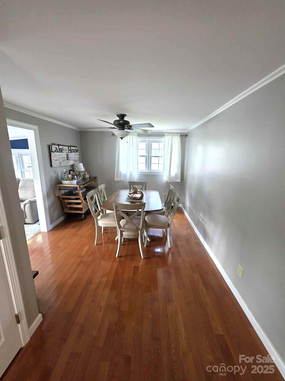 361 Reynolds Road, Unit 7 Lexington, NC 27292 - Photo 11 of 18 a living room with furniture and wooden floor
