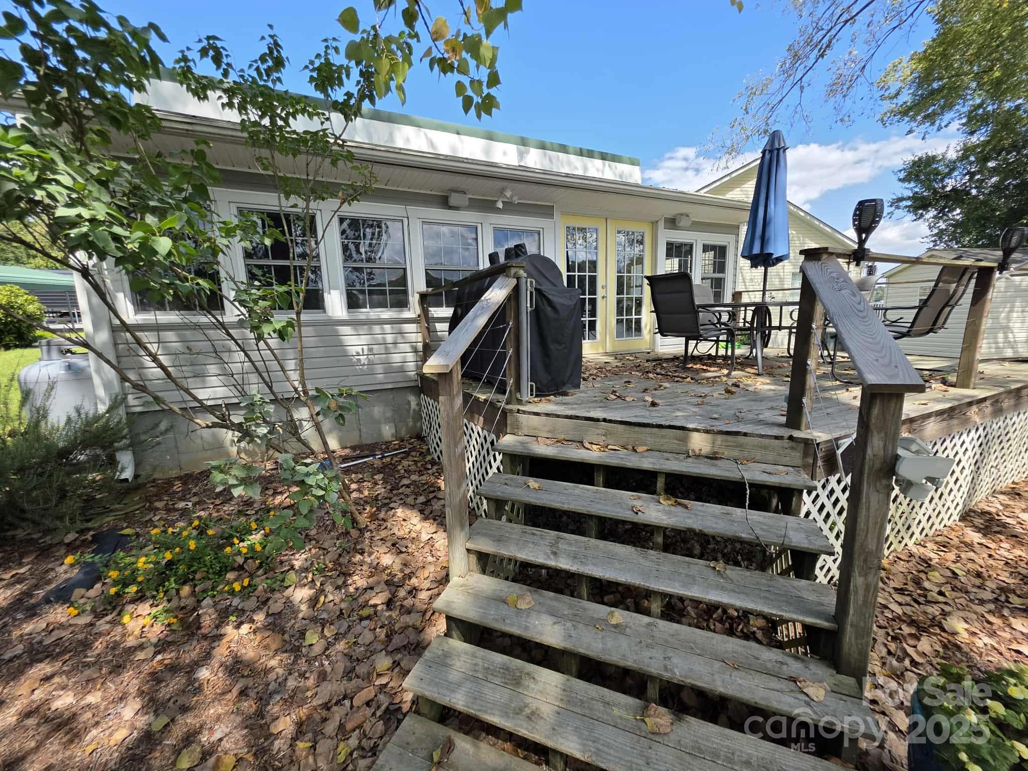 361 Reynolds Road, Unit 7 Lexington, NC 27292 - Photo 18 of 18 a view of a house with a door front of house