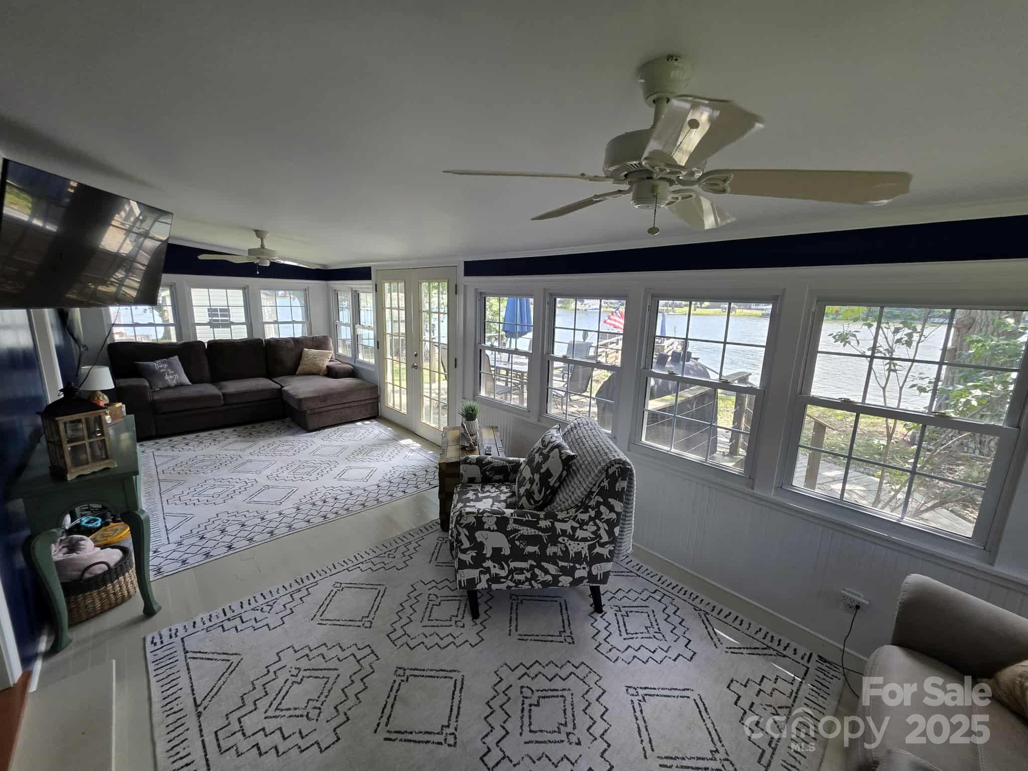 361 Reynolds Road, Unit 7 Lexington, NC 27292 - Photo 9 of 18 a living room with furniture fireplace and a large window