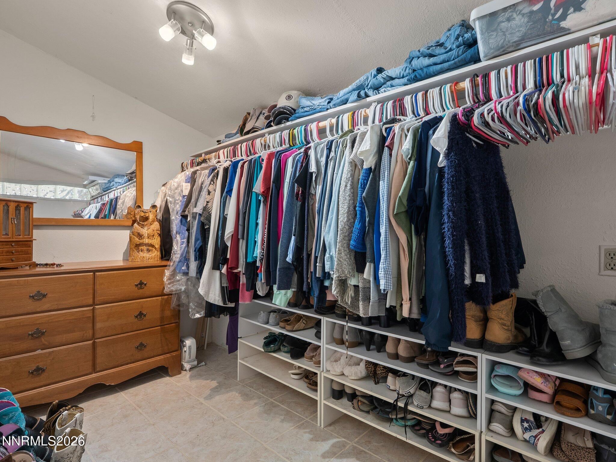 5500 Peak Road Reno, NV 89510 - Photo 28 of 56 a view of walk in closet with clothes and shoes