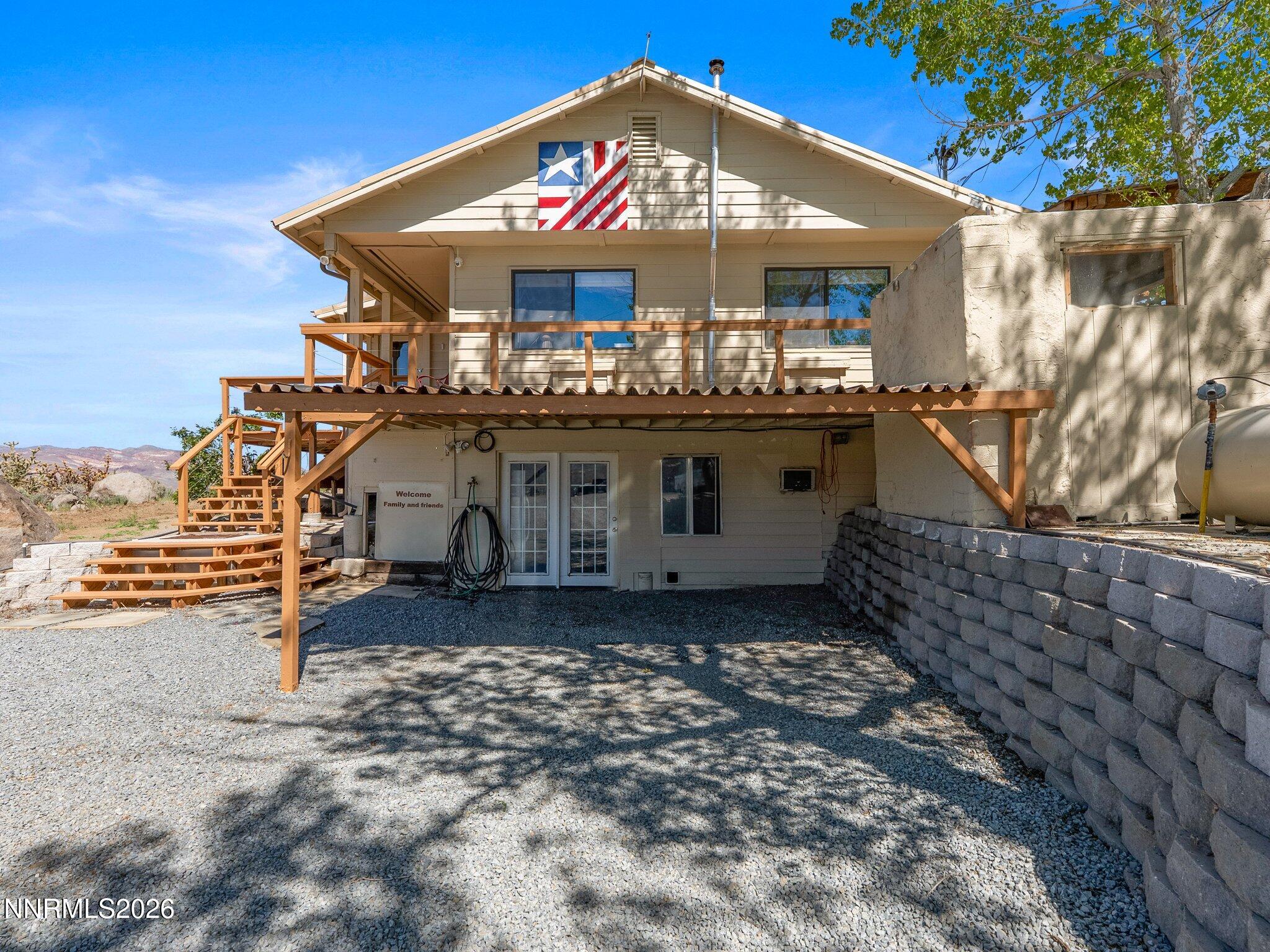 5500 Peak Road Reno, NV 89510 - Photo 3 of 56 a view of a house with a patio