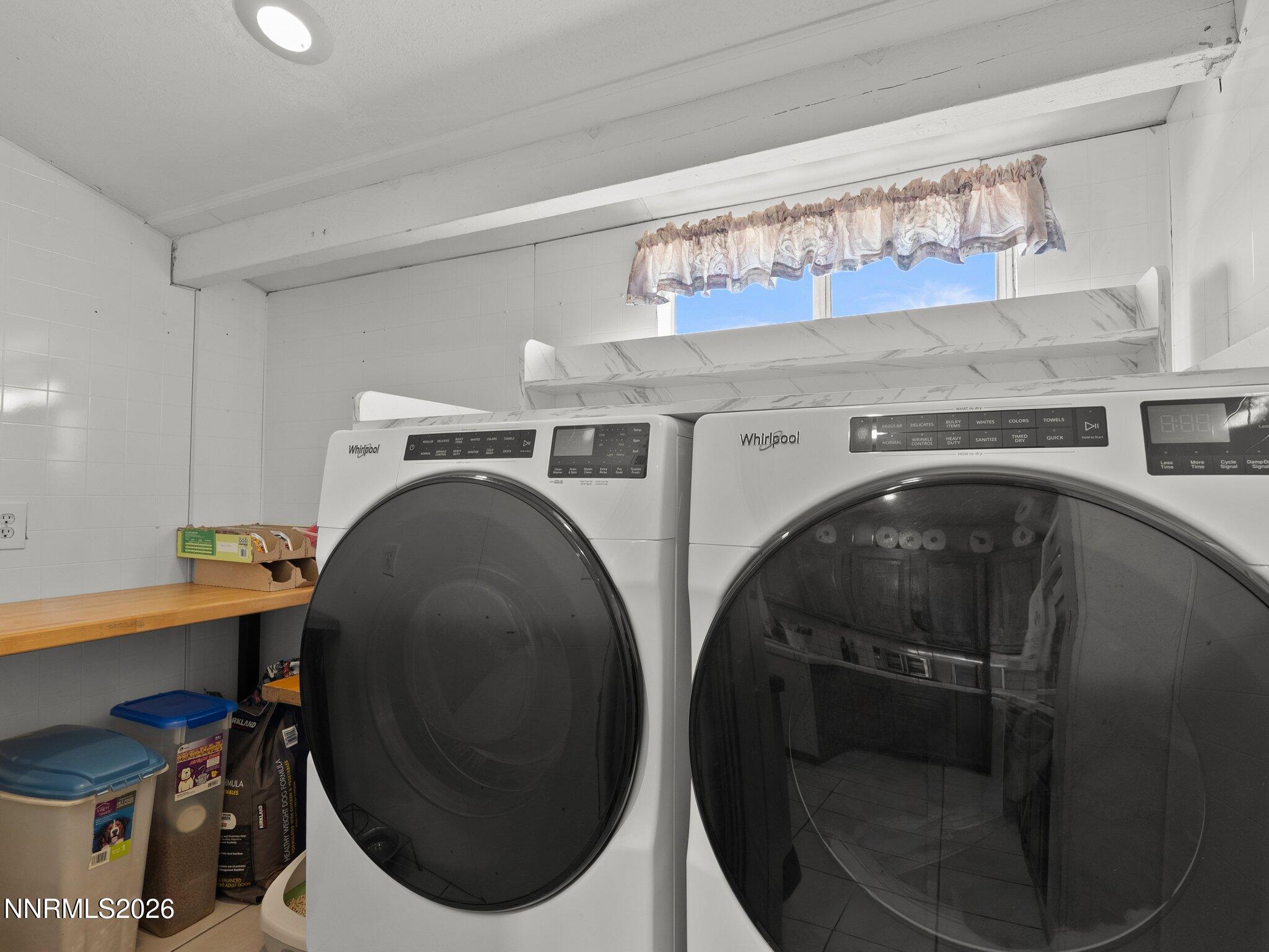 5500 Peak Road Reno, NV 89510 - Photo 33 of 56 a utility room with dryer and washer