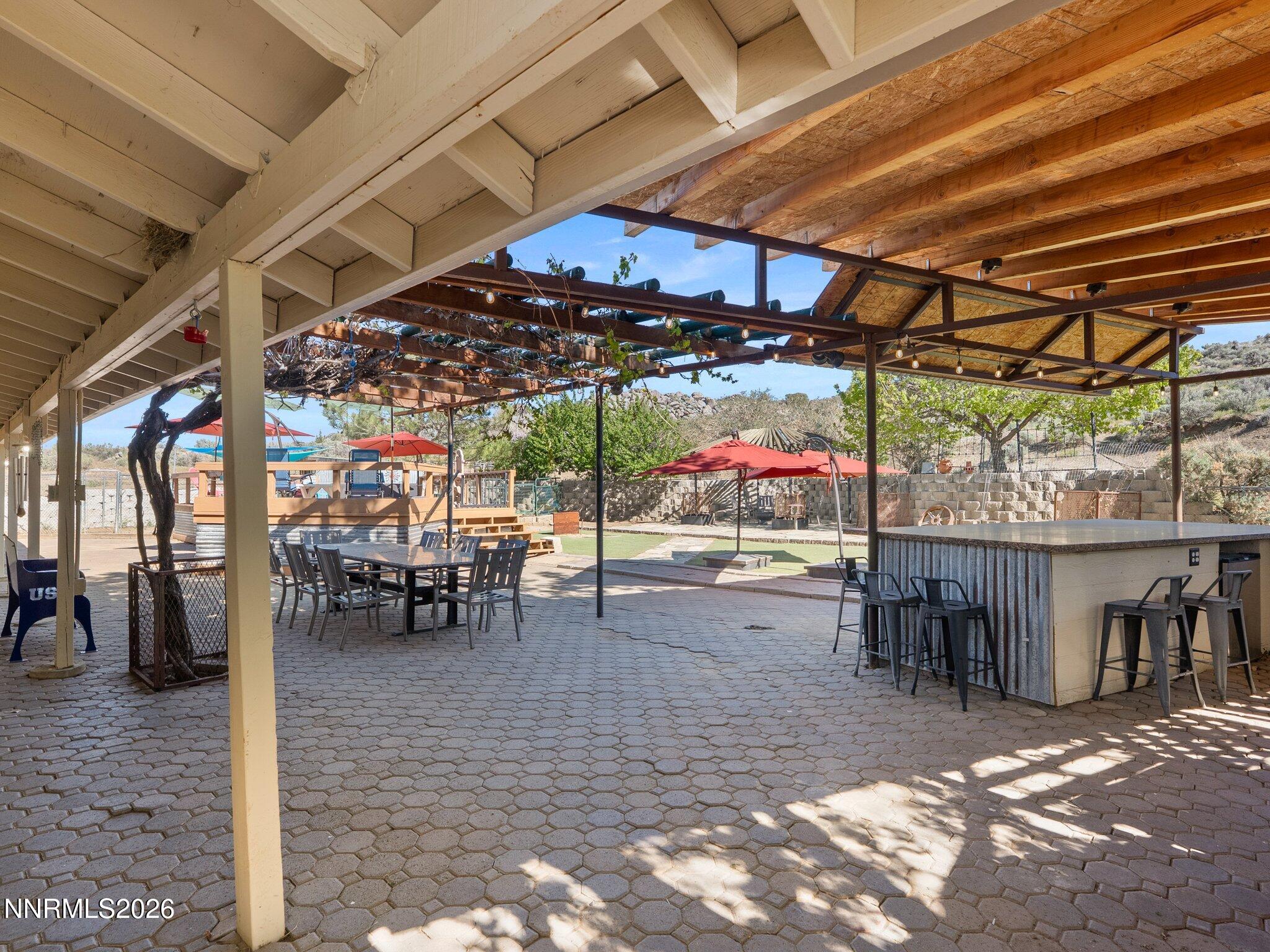 5500 Peak Road Reno, NV 89510 - Photo 36 of 56 a view of a tables and chairs in patio