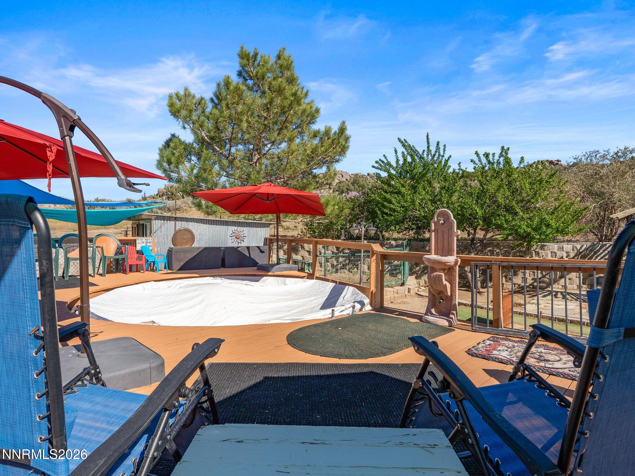 5500 Peak Road Reno, NV 89510 - Photo 43 of 56 a view of a patio with swimming pool