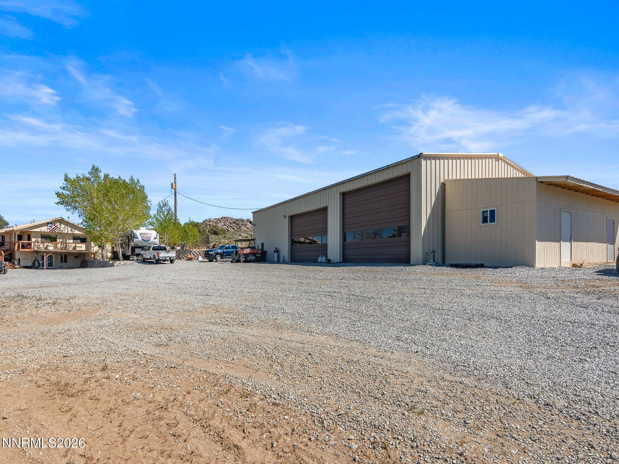 5500 Peak Road Reno, NV 89510 - Photo 45 of 56 a view of a house with a yard