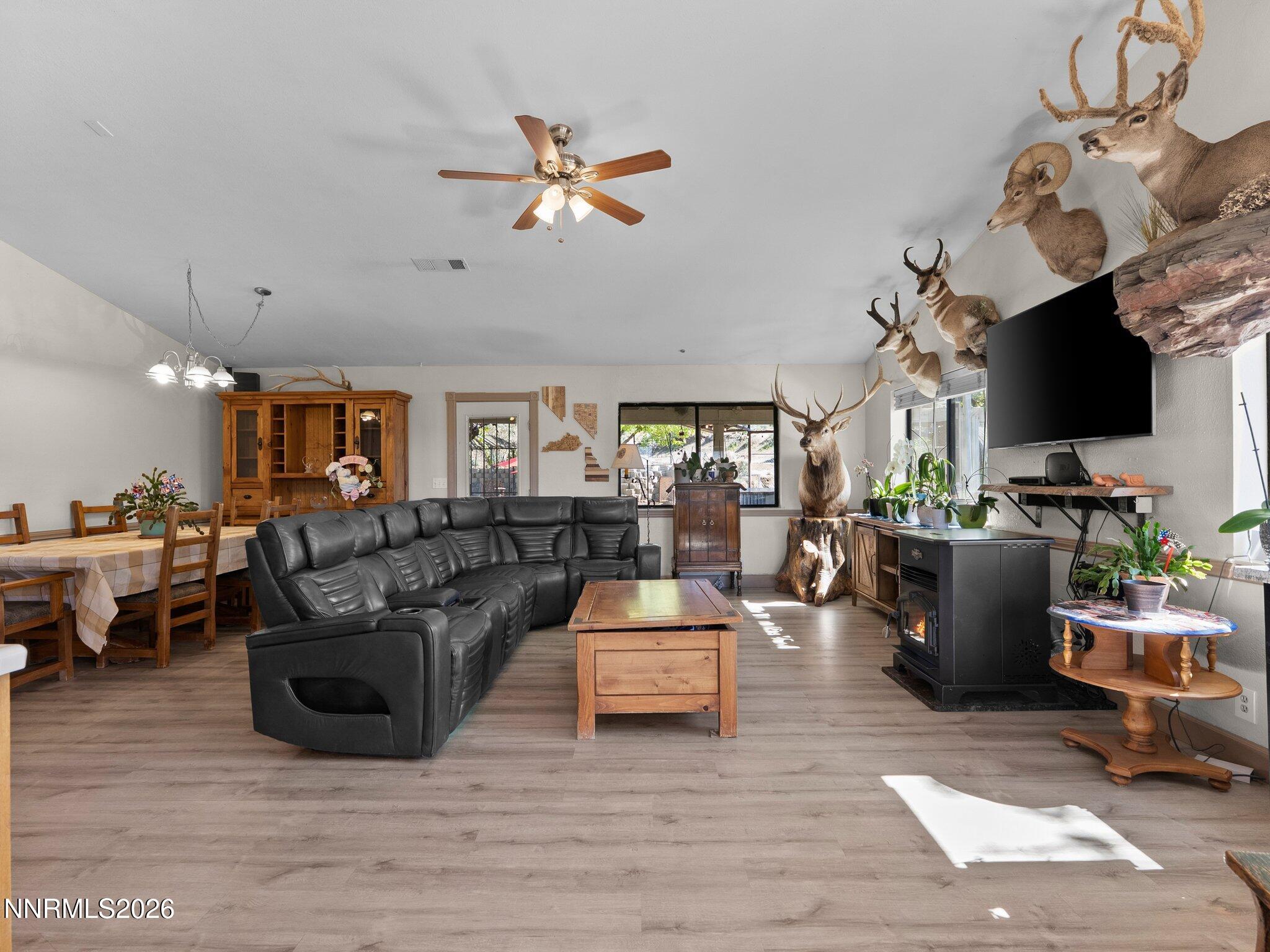 5500 Peak Road Reno, NV 89510 - Photo 9 of 56 a living room with furniture and a flat screen tv