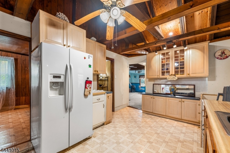 308 Lakeside Avenue Hopatcong, NJ 07821 - Photo 7 of 13 a kitchen with stainless steel appliances granite countertop a refrigerator and a sink