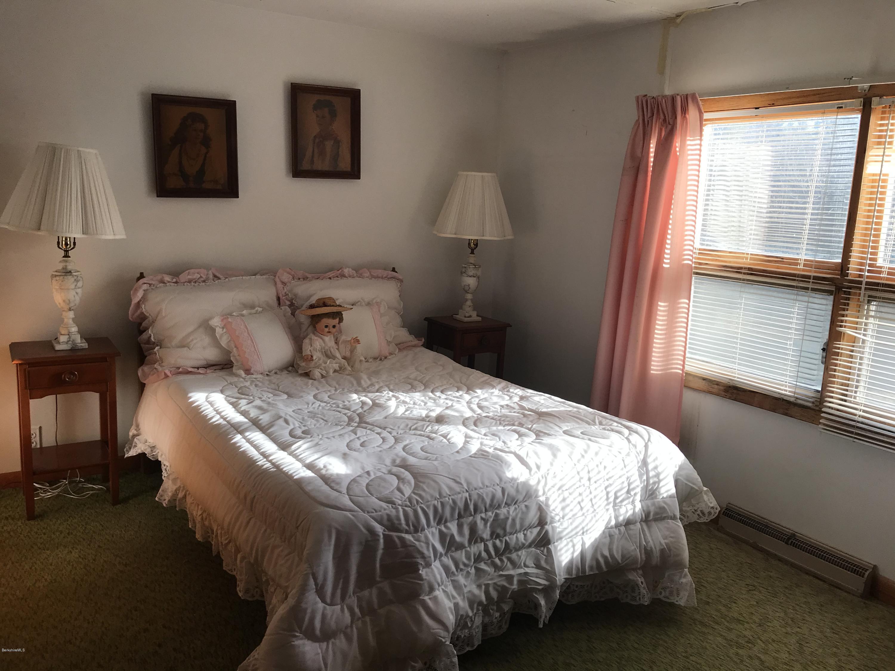 274 South County Road Florida, MA 01343 - Photo 11 of 16 a bedroom with a bed and window