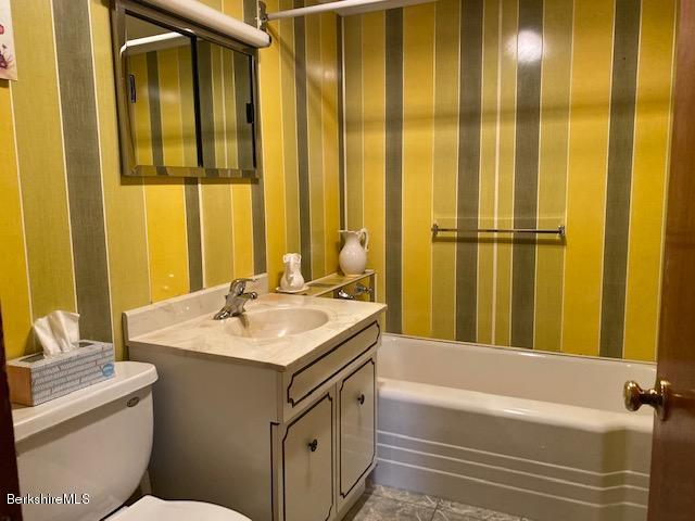 274 South County Road Florida, MA 01343 - Photo 14 of 16 a bathroom with a sink and a bathtub