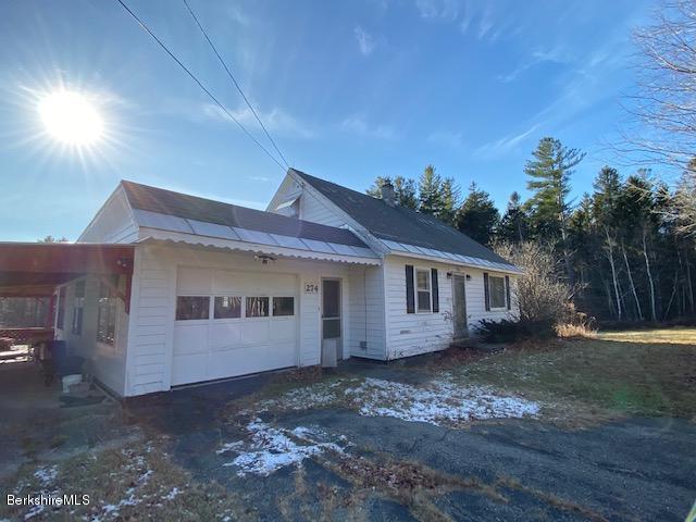 274 South County Road Florida, MA 01343 - Photo 15 of 16 a view of a house with a backyard