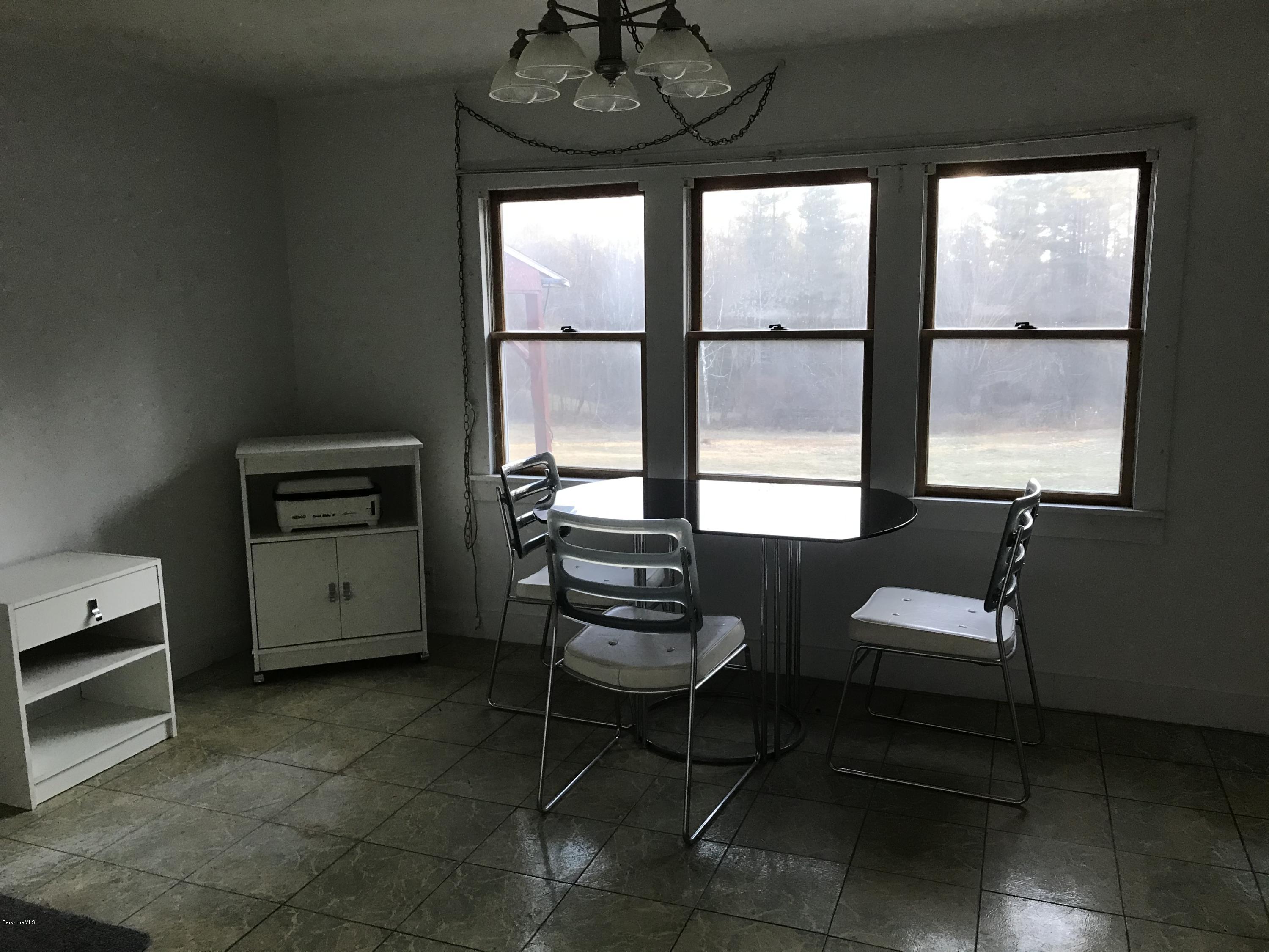 274 South County Road Florida, MA 01343 - Photo 3 of 16 a view of a room with furniture and window
