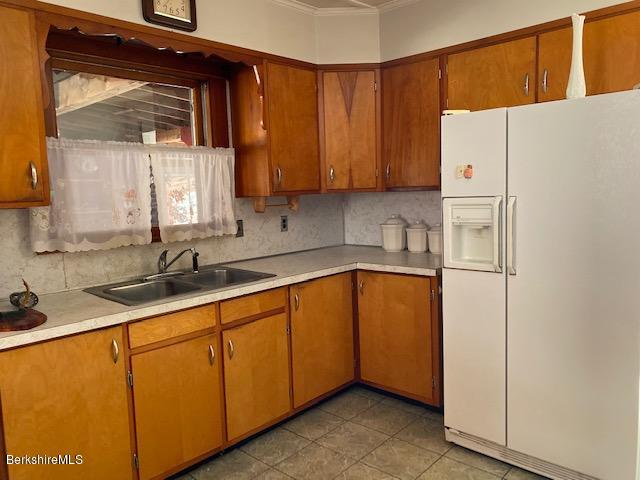 274 South County Road Florida, MA 01343 - Photo 6 of 16 a kitchen with granite countertop white cabinets and white appliances